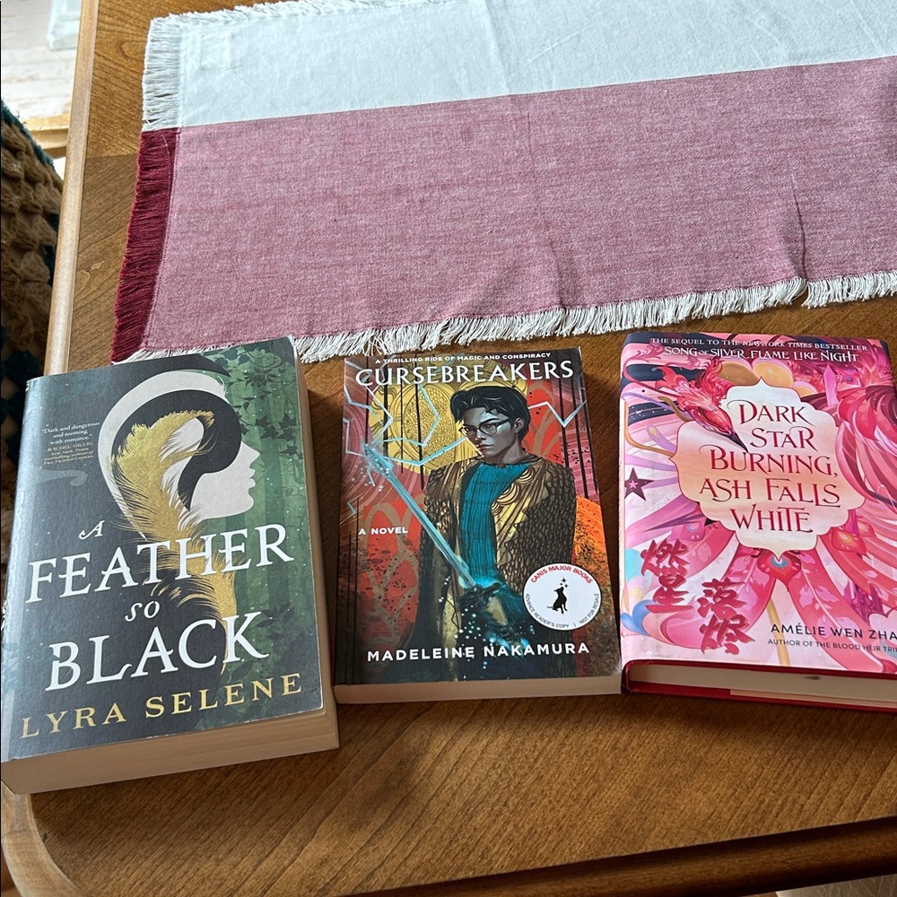 A Feather So Black, Dark Star Burning, Ash Falls White and Cursebreakers Books